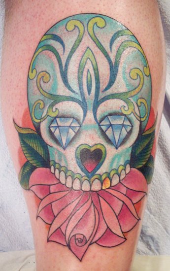 candy skull tattoo. and sugar skull tattoos.
